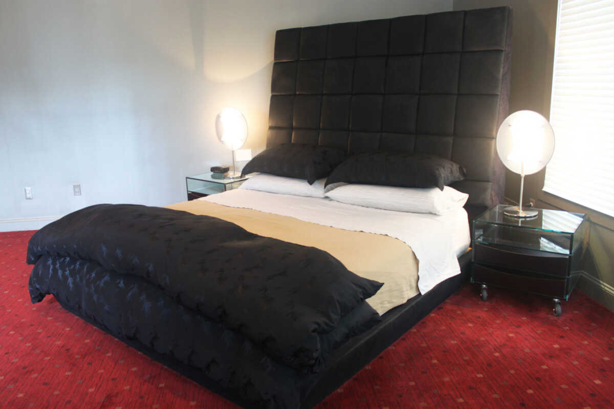 White Walls in Black and Red Bedroom