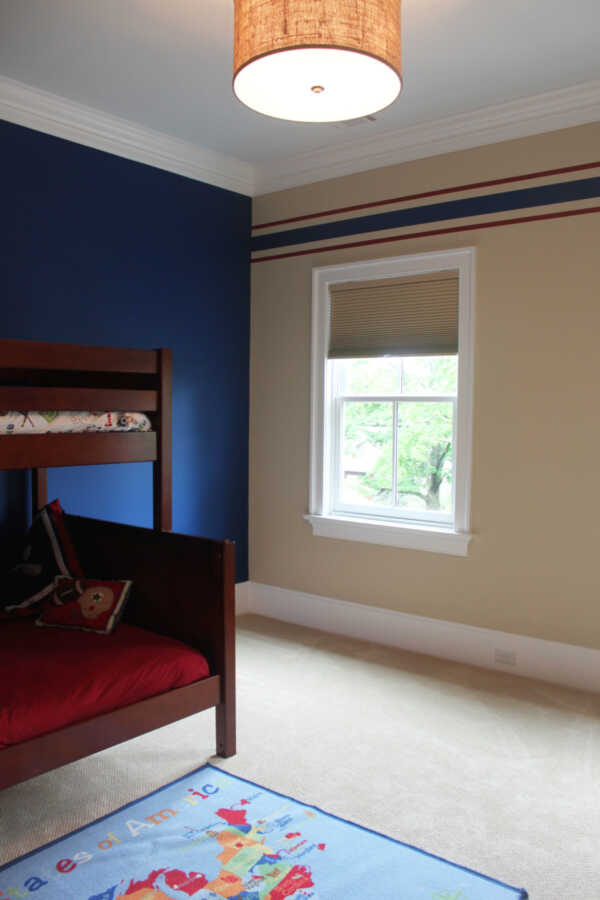 Deep Blue Accent Wall in Boy's Room