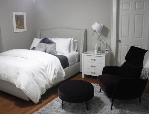 Gray and White Bedroom with a Touch of Purple